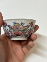 Four Chinese famille rose cups and three saucers with floral design, Yongzheng