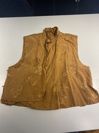 Four Chinese embroidered silk skirts and three yellow 'magua' jackets, 19/20th C.