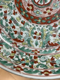 A Chinese wucai dish with stylized floral design, Kangxi