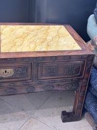 A Chinese carved wooden stand and a low table with marble tops, 19th C.