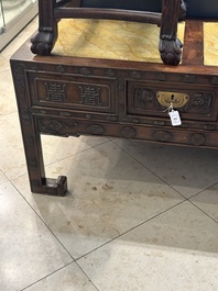 A Chinese carved wooden stand and a low table with marble tops, 19th C.