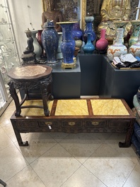 A Chinese carved wooden stand and a low table with marble tops, 19th C.