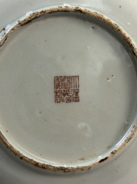 A pair of Chinese famille rose 'rice production' plates, Daoguang mark, 20th C.