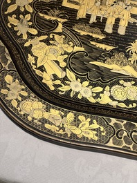 A large Chinese Canton gilt black lacquer tray, thee boxes and a fan, 19th C.