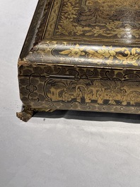 A large Chinese Canton gilt black lacquer tray, thee boxes and a fan, 19th C.