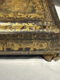 A large Chinese Canton gilt black lacquer tray, thee boxes and a fan, 19th C.