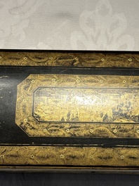 A large Chinese Canton gilt black lacquer tray, thee boxes and a fan, 19th C.