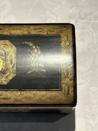 A large Chinese Canton gilt black lacquer tray, thee boxes and a fan, 19th C.