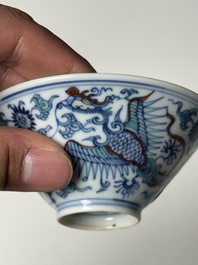 A Chinese doucai conical 'phoenixes' bowl, Chenghua mark, Kangxi/Yongzheng