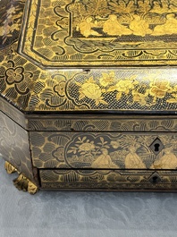 A large Chinese Canton gilt black lacquer tray, thee boxes and a fan, 19th C.