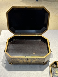 A large Chinese Canton gilt black lacquer tray, thee boxes and a fan, 19th C.