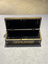 A large Chinese Canton gilt black lacquer tray, thee boxes and a fan, 19th C.