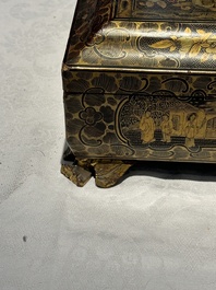 A large Chinese Canton gilt black lacquer tray, thee boxes and a fan, 19th C.