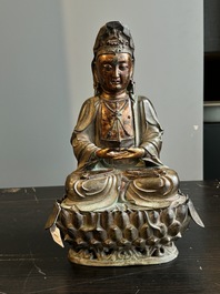 A fine Chinese partly lacquered and gilt bronze sculpture of Bodhisattva on lotus throne, Ming