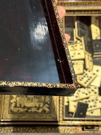 A large Chinese Canton gilt black lacquer tray, thee boxes and a fan, 19th C.