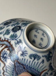 A Chinese doucai conical 'phoenixes' bowl, Chenghua mark, Kangxi/Yongzheng