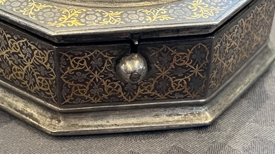 An Iranian octagonal parcel-gilt and silver inlaid box, 18/19th C.