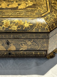 A large Chinese Canton gilt black lacquer tray, thee boxes and a fan, 19th C.