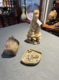 A Chinese soapstone and a crystal figures of Guanyin and a jade 'chilong' plaque, 19th C.