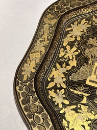 A large Chinese Canton gilt black lacquer tray, thee boxes and a fan, 19th C.