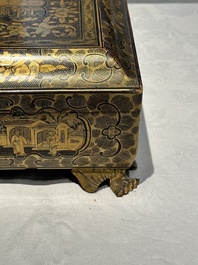 A large Chinese Canton gilt black lacquer tray, thee boxes and a fan, 19th C.