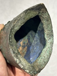 A rare Chinese inscribed archaic bronze bell, Eastern Zhou