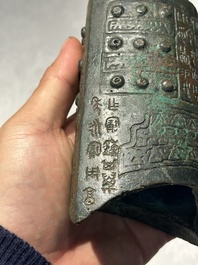 A rare Chinese inscribed archaic bronze bell, Eastern Zhou