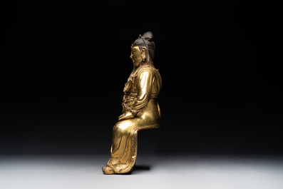 An extremely rare Chinese gilt bronze figure of Guandi, Ming