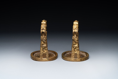 A pair of Chinese imperial gilt-bronze stirrups with dragons, De 德 mark, 18th C.