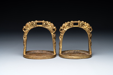 A pair of Chinese imperial gilt-bronze stirrups with dragons, De 德 mark, 18th C.