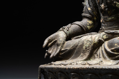 A large Chinese bronze sculpture of Bodhisattva on a lotus throne, Ming