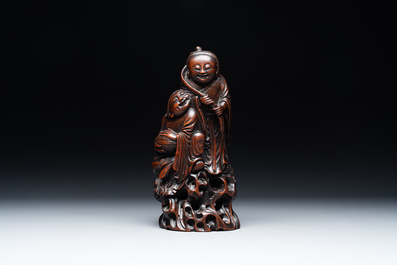 A large Chinese carved bamboo group of 'Hehe Erxian', 17th C.