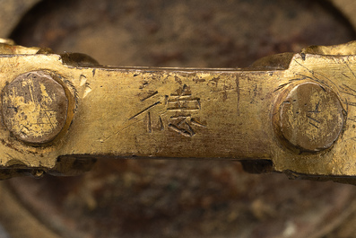 A pair of Chinese imperial gilt-bronze stirrups with dragons, De 德 mark, 18th C.