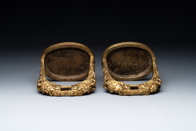 A pair of Chinese imperial gilt-bronze stirrups with dragons, De 德 mark, 18th C.