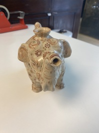 A rare Vietnamese polychrome painted stoneware elephant shaped jug, L&ecirc; dynasty, 16th C.