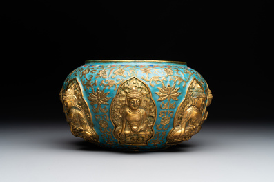 A Chinese gilt and champlev&eacute; enamelled bronze bowl with Buddhas in relief, 19/20th C.