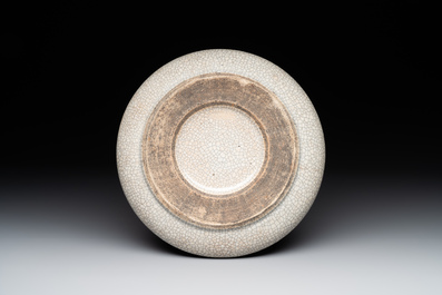 A Chinese ge-type brush washer, a pair of pink bowls, two plates and a saucer, Kangxi and later