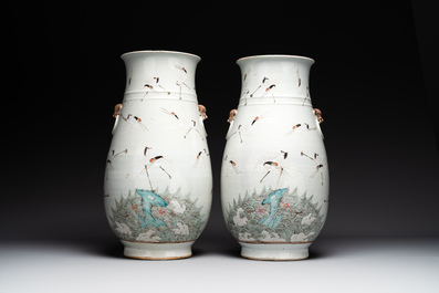 A pair of Chinese famille rose vases with cranes, 19th C.