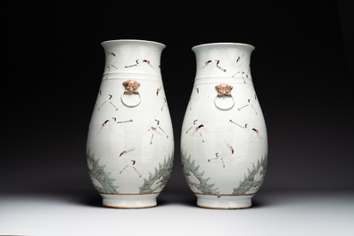 A pair of Chinese famille rose vases with cranes, 19th C.