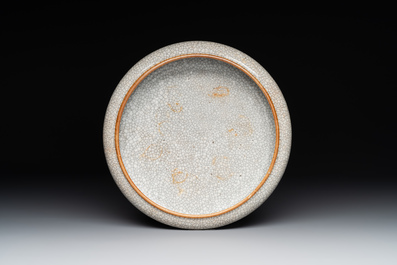 A Chinese ge-type brush washer, a pair of pink bowls, two plates and a saucer, Kangxi and later
