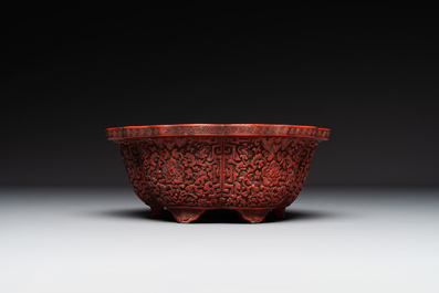 A Chinese red cinnabar lacquer jardiniere with floral design, Yongzheng/Qianlong