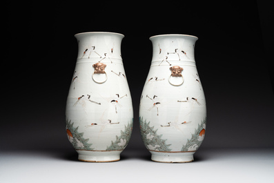 A pair of Chinese famille rose vases with cranes, 19th C.
