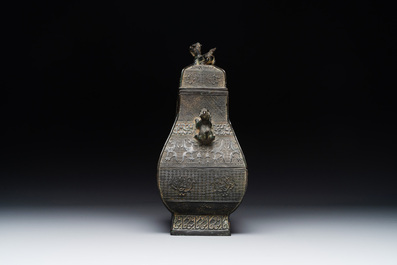 A Chinese archaistic bronze ritual wine vessel and cover in Western Zhou-style, 'fanghu 方壺', Ming