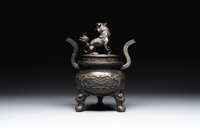 A large Chinese bronze censer and cover with a Buddhist lion, Ming