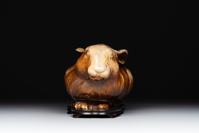 A fine Chinese cafe-au-lait glazed hare on wooden stand, Tian 天 mark, Qing