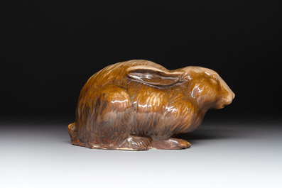 A fine Chinese cafe-au-lait glazed hare on wooden stand, Tian 天 mark, Qing