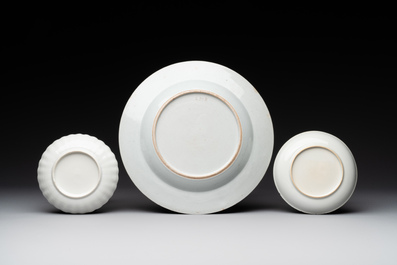 Two Chinese export grisaille cups and saucers and a plate, Qianlong