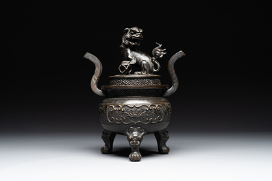 A large Chinese bronze censer and cover with a Buddhist lion, Ming