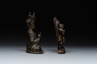 A Chinese bronze Guanyin, Ming and a Tibetan polychrome plaster relief, 19th C.
