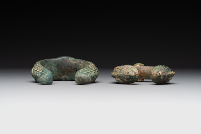 A bronze mirror, a bracelet with a royal or noble emblem and a bronze bracelet with two tiger heads, Cambodia, 12th C.